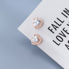 עגילי כסף 925 בצורת לב משובצים – כסף/רוז זהב